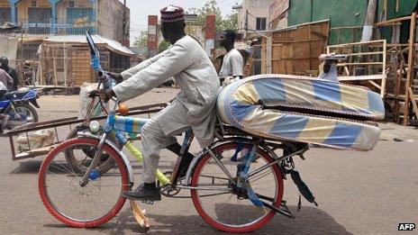 Cyclist in Kano, Nigeria