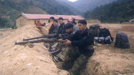 File photo of Maoist rebels in Nepal (2004)