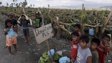 Residents appeal for aid in Montevista township, Compostela Valley, southern Philippines on 9/12/12