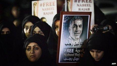 Women in Bahrain hold up a placard calling for the release of Nabeel Rajab (10 December 2012)