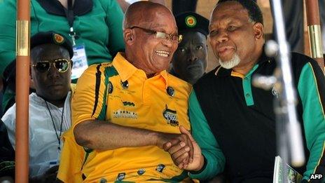 Jacob Zuma and Kgalema Motlanthe shake hands in Bloemfontein (8 January 2012)