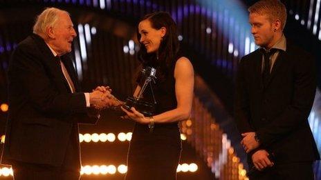 Sir Roger Bannister hands the BBC Sports Personality Team of the Year award to Victoria Pendleton