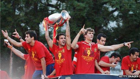 Cesc Fabregas holds aloft the Euro 2012 trophy in Madrid