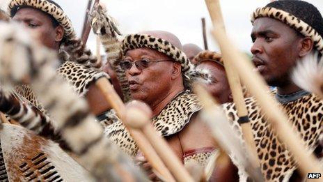 President Jacob Zuma with several people in traditional regalia (January 2010)