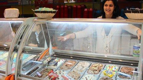 Ruweida al-Rayes behind a gelato counter