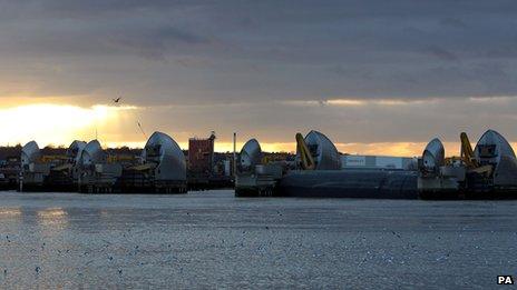 Views of the closed section of the Thames Barrier from Silvertown, Docklands, after heavy rain