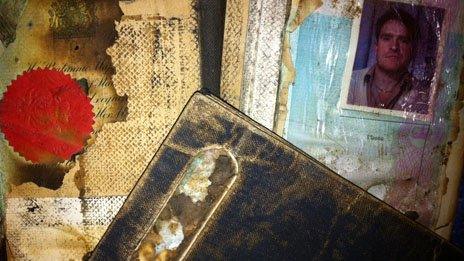 The charred remains of Victor Prazak's passports, returned to his widow years after the Flight 1103 disaster