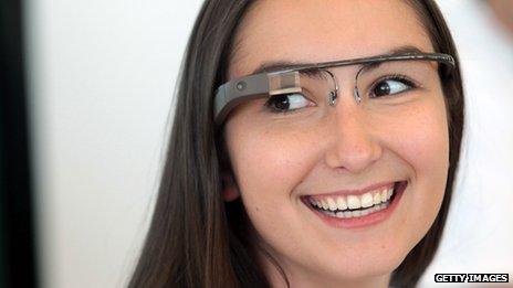 A Google employee wearing the company's Glass spectacles