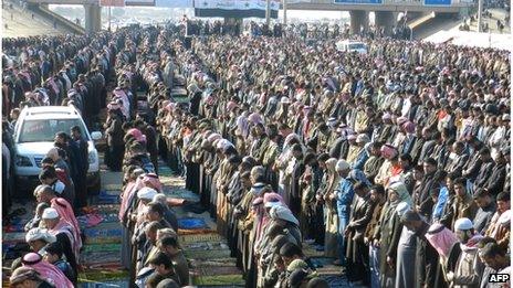 Thousands of Sunni Muslims pray on the main road in Ramadi, centre of demonstrations against the government