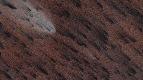 Image of Martian surface showing fan-shaped deposits