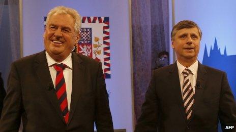 Jan Fischer (R) and Milos Zeman, both Presidential candidates arrive at a studio for a Television debate on January 4, 2013 in Prague. The first Czech direct presidential election will be held on January 11-12, 2013