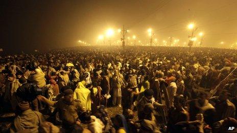 Thousands of Hindu devotees gather at Sangam, the confluence of the Ganges, Yamuna and mythical Saraswati river on Makar Sankranti, the first day of the Maha Kumbh Mela, in Allahabad, early Monday morning, Jan. 14, 2013.
