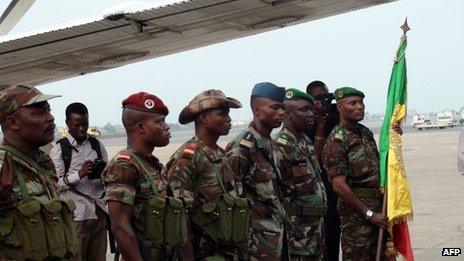 Benin soldiers prepare to leave Cotonou for Mali on 18 January 2013 at the Cotonu airport
