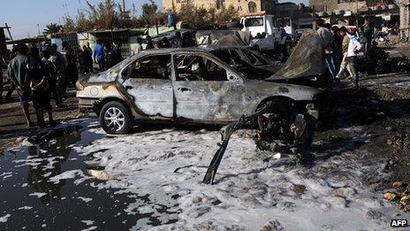 Aftermath of car bomb in Shula district of Baghdad. 22 Jan 2013