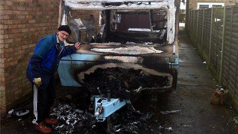 Roy Griffiths with his burned out caravan