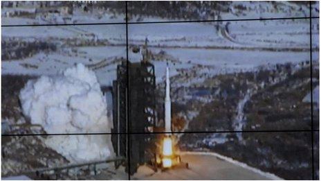 A screen shows the Unha-3 (Milky Way 3) rocket being launched from a launch pad in North Korea released by the official KCNA news agency, 12 December 2012