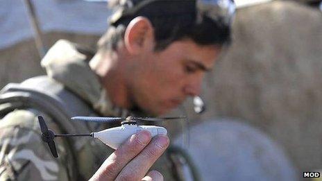 Soldier holds Black Hornet Unmanned Air Vehicle in Afghanistan