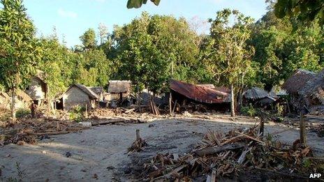Damaged houses in the village of Venga in the Santa Cruz Islands region of the Solomon Islands on 6 February 2013