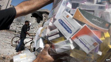 Bag of medicines salvaged from bombed pharmacy in the Bustan Pasha neighbourhood of Syria's northern city of Aleppo on 23 August 2012.