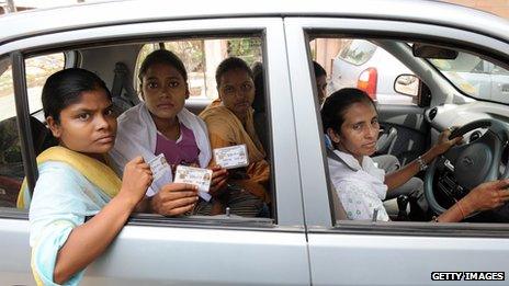 Drivers with Sakha in Delhi show their licences