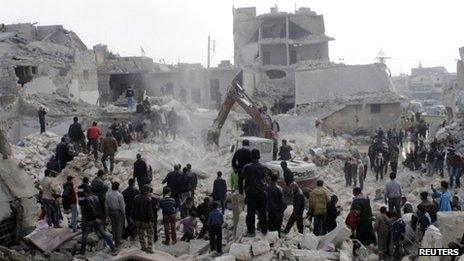 Peopel search for survivors after a rocket strike on Aleppo. Photo: 19 February 2013