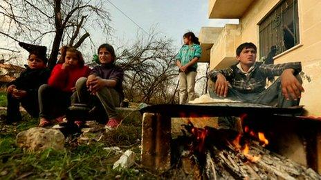 Syrian children outside a home in Idlib province