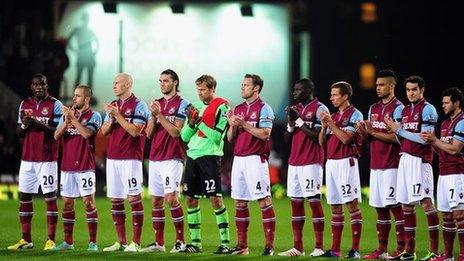 West Ham players led a minute's applause