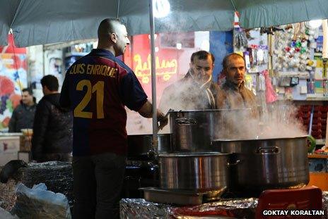 Street vendor in Erbil in Barca shirt