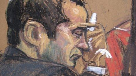 Former New York City police officer Gilberto Valle listens as wife Kathleen Mangan testifies in this courtroom sketch on the first day of his trial in New York 25 February 2013