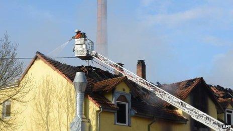 Firefighters extinguish the blaze in Backnang, 10 March