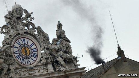 Black smoke issues from Sistine Chapel chimney