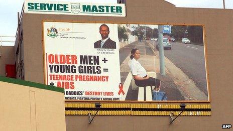 A billboard in Durban, South Africa, discouraging young girls from having sex with older men (23 July 2012)