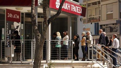 Queues outside a branch of Cyprus's Laiki Bank in Nicosia on 29/3/13