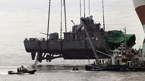 A crane lifts the Cheonan from the seabed (12 April 2010)