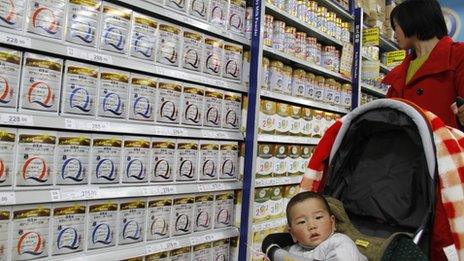 A mother and baby in a supermarket in Nanjing