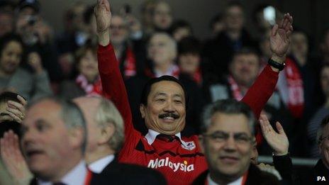Cardiff City chairman Vincent Tan celebrating his team's promotion