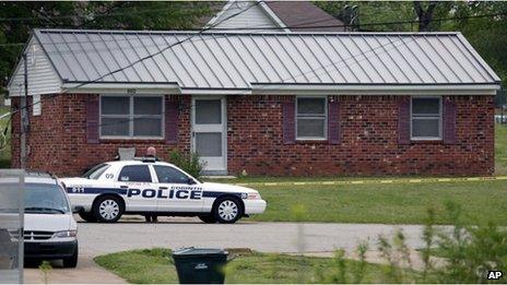 A police car outside a house in the West Hills Subdivision in Corinth, Mississippi on 18 April 2013