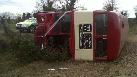 Overturned double-decker bus, near Lisburn