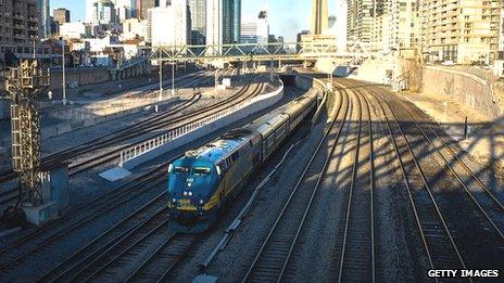 A VIA Rail train leaves Union Station in Toronto, Ontario, Canada. 22 April 2013