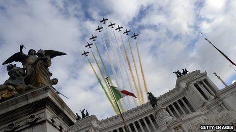 The Frecce Tricolori, the aerobatic demonstration team of the Italian Aeronautica Militare, fly over the Altare della Patria (The tomb of the Unknown Soldier) in Rome on April 22, 2013, as the Italian President Giorgio Napolitano attends a ceremony after his re-election. Italy's 87-year-old president prepared to be sworn in for an unprecedented second term, amid hopes of an end this week to a deadlock on forming a new government.