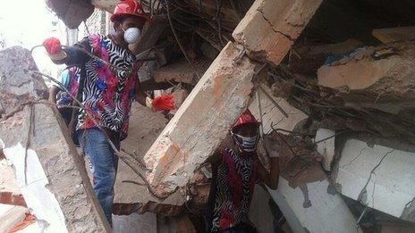 Rescuers at scene of building collapse, Dhaka. 27 April 2013