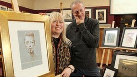 Terry and Peter Howson with some of his work which is being sold