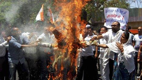 Opposition Congress Party activists protest in Bhopal, India, on 30 April 2013