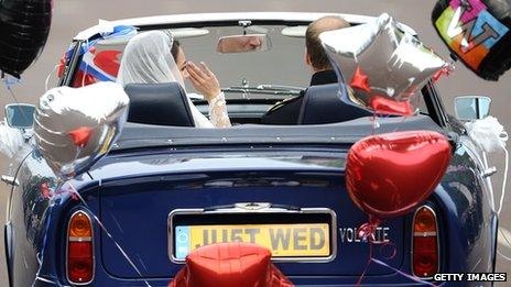 The Duke and Duchess of Cambridge drive a car bearing the plate JU5T WED after marrying in April 2011