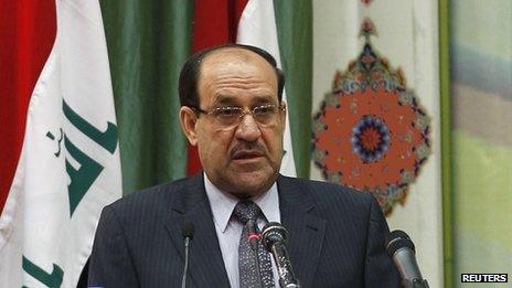 Nuri al-Maliki speaks at a conference in Baghdad (27 April 2013)