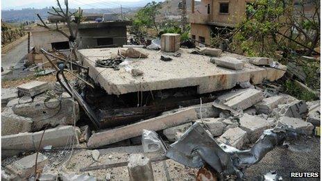 Picture from Syrian national news agency Sana, which it says shows damage after an Israeli air strike near Damascus (05/05/13)