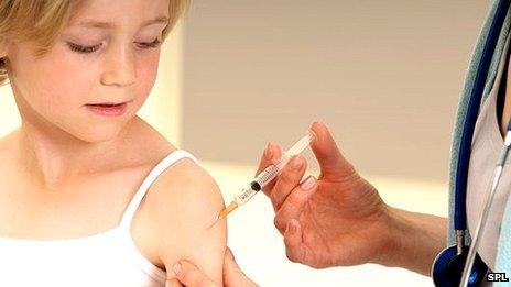 A child being given an injection