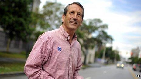 Former South Carolina Governor Mark Sanford crosses the street after voting at a polling place in Charleston, South Carolina 7 May 2013