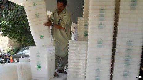 A Pakistani worker prepares ballot boxes in Khyber Pakhtunkhwa province on 9 May,2013