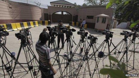 Journalists outside the residence of former president Pervez Musharraf in Islamabad on 19 April, 2013